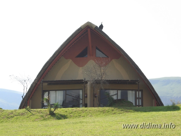 Exterior of a two-sleeper chalet without kitchen at Didima Camp in the Drakensberg
